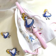 Λαμπάδα αρωματική ροζ με την Αλίκη και σακίδιο