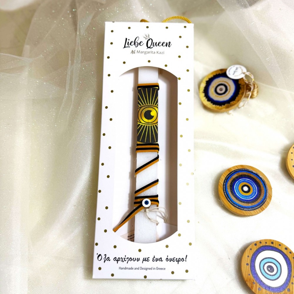 Λαμπάδα αρωματική λευκή με δερμάτινα κορδόνια και ματόχαντρα