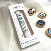 Λαμπάδα αρωματική λευκή με τυρκουάζ ματόχαντρα