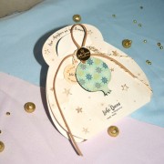 Γούρι Ρόδι γαλάζιο κρεμαστό ξύλινο με σχέδιο και κορδόνια