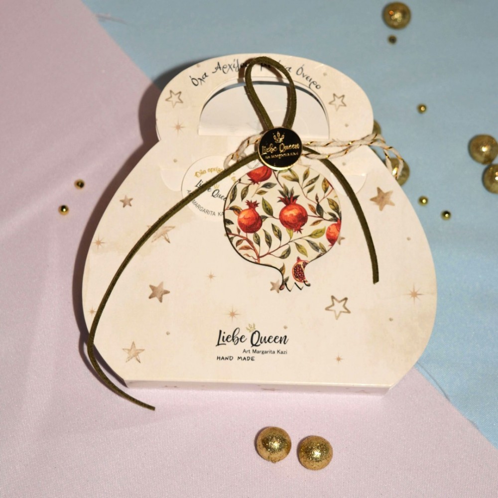 Γούρι Ρόδι  κρεμαστό ξύλινο ιβουάρ με σχέδιο ρόδια  και κορδόνια