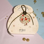 Γούρι Ρόδι  κρεμαστό ξύλινο ιβουάρ με σχέδιο ρόδια  και κορδόνια