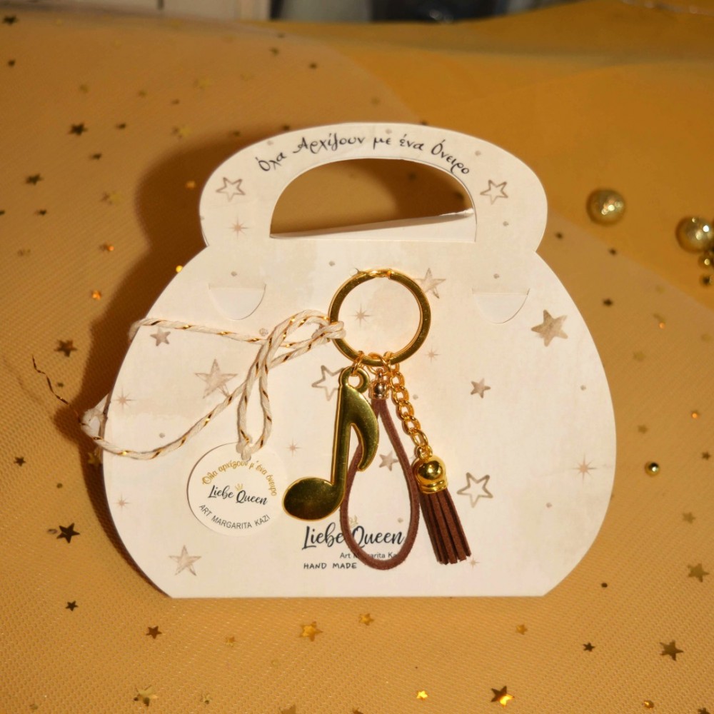 Γούρι μπρελόκ χρυσό με νότα 