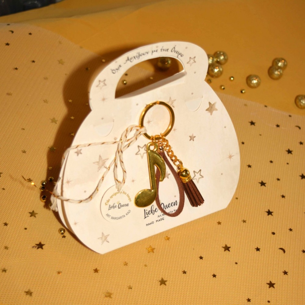 Γούρι μπρελόκ χρυσό με νότα 