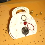 Γούρι μπρελόκ ασημί ρόδι πλεξιγκλάς