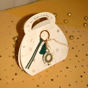 Γούρι μπρελόκ ρόδι με σχέδιο στεφάνι ελιάς